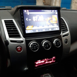 Магнитола для Mitsubishi L200 4, Pajero Sport 2 2006-2016 - FarCar BM094M монитор 9.5" QLED на Android 14, TS10, 4+32Гб, CarPlay, 4G SIM-слот