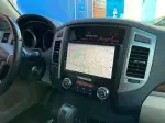Магнитола для Mitsubishi Pajero 4 2006-2022 - FarCar 1009M монитор 9.5" QLED на Android 14, TS18, CarPlay, 4G SIM-слот