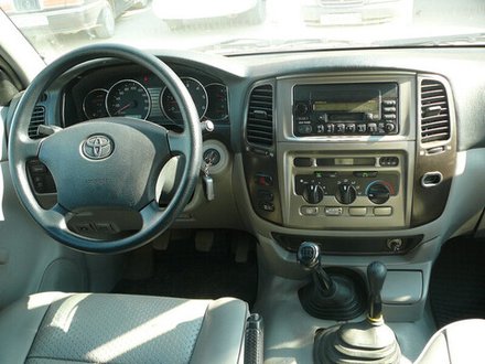 Магнитола для Toyota Land Cruiser 105 1998-2007 - FarCar 457/1234M монитор 9.5" QLED на Android 14, TS18, CarPlay, 4G SIM-слот
