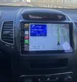 Магнитола для KIA Sorento 2 XM 2012-2016 (климат на ШГУ, рамка большая) - FarCar 224UM монитор 9.5" QLED на Android 14, TS18, CarPlay, 4G SIM-слот