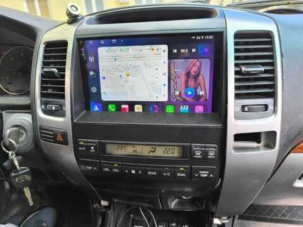 Магнитола для Toyota Land Cruiser Prado 120, Lexus GX470 (экран климата внизу, большая рамка) - FarCar XXL9-8001F3 монитор 9.5" 2K QLED на Android 14, TS20, 8+256Гб, CarPlay, 4G SIM-слот