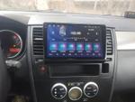 Магнитола для Nissan Tiida C11 2004-2013 (климат с круглым экранчиком, рамка черная) - FarCar DX9-1148CLB монитор 9.5" IPS на Android 13, 4+64Гб, CarPlay